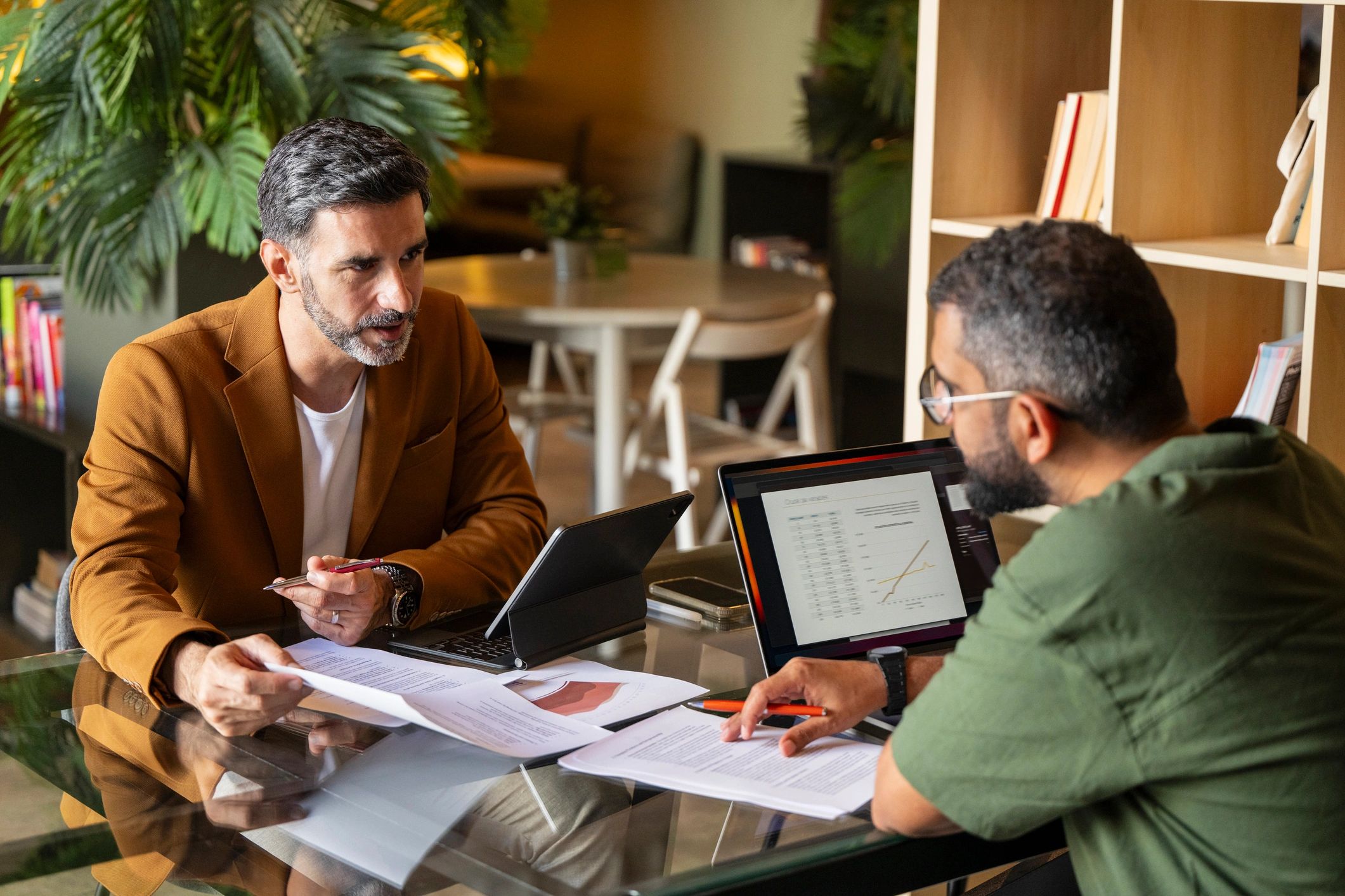 Financial professionals reviewing refinance options